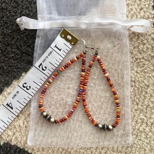 Navajo pearls and orange spiny earrings